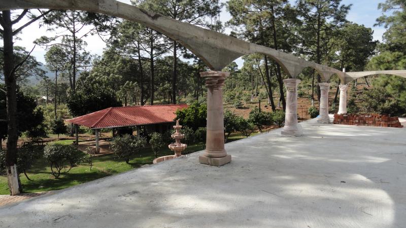 Columns of quarry stone and concrete arcs